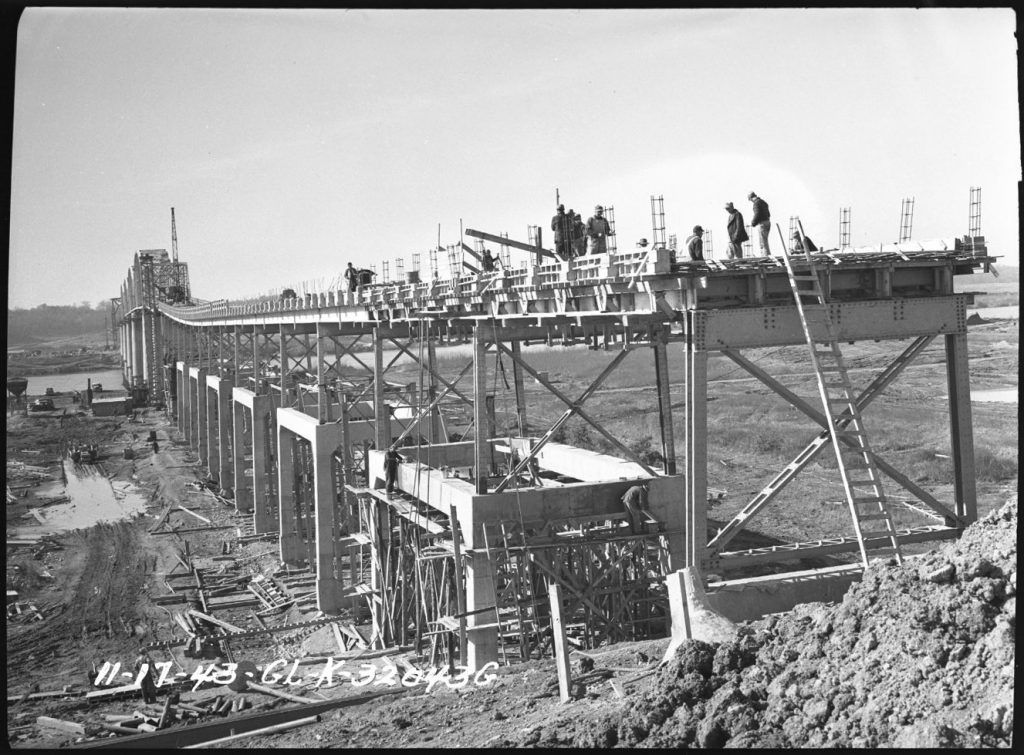 Workers raise the existing Eggners Ferry Bridge in this photo from November 1944 to make way for Kentucky Lake.